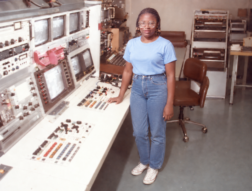 Edie Clarke standing inside a TV control room in St. Thomas